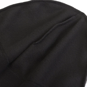 Close-up detail of a black thermal fleece winter beanie hat showing soft fabric texture