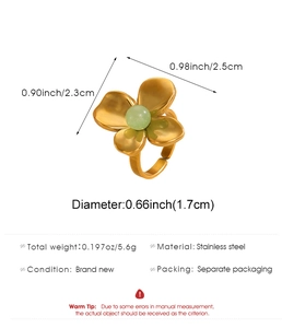 Detailed view of gold stainless steel four-petal flower ring with size specifications