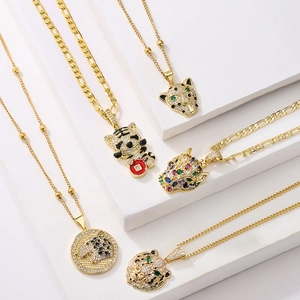 Set of five 18K gold plated necklaces featuring zircon leopard and tiger head pendants