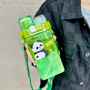 Detail of green square panda water bottle with straw and adjustable logo strap
