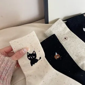 Breathable cotton crew socks with animal embroidery and colorful flecked knit texture
