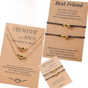 Polished 18k gold knot necklace and adjustable bracelet set with friendship message card