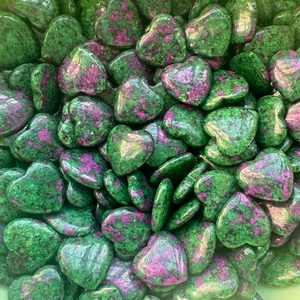 Close-up of polished heart-shaped Ruby in Zoisite natural stones with green and pink spots