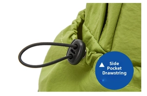 Detailed macro view of side pocket with black adjustable drawstring buckle on green backpack