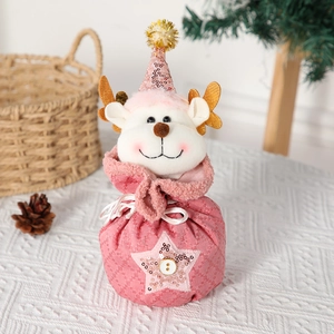 Sacchetto regalo di Natale rosa con renna, corna dorate e dettagli in paillettes lucide