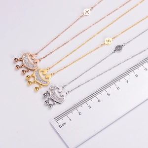 Detailed scale measurement of three long-life lock necklaces in rose gold, gold, and silver