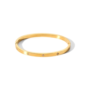 Bracciale rigido in acciaio dorato con cinque pietre di zirconia incastonate a stella