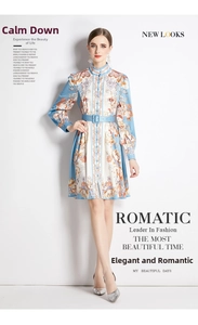 Floral print A-line dress with stand collar, matching belt and long sleeves in blue and white