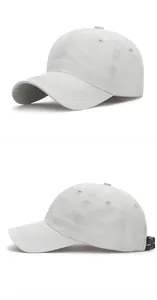 Detail of breathable eyelets and quick-dry fabric on white curved brim baseball cap