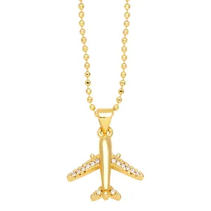 Hip hop style gold airplane pendant necklace with zircon crystals on a beaded ball chain