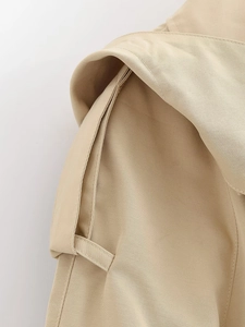 Detail of khaki twill fabric and premium stitching on the hooded trench coat jacket