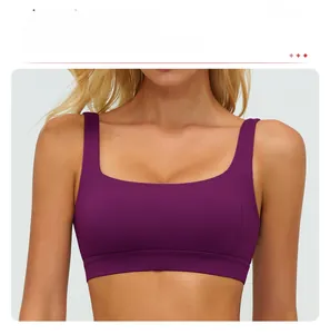 Macro detail of plum purple sports bra featuring a supportive square neckline design
