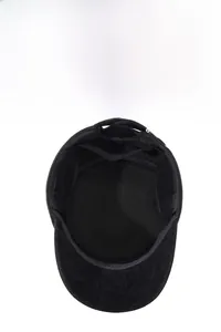 Detail view of thickened thermal lining and wool fabric texture of a winter flat top cap