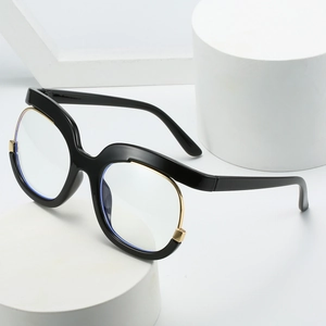Y2K fashion oversized round glasses in black and gold frame with anti-blue light lenses