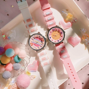 Close-up of candy-colored silicone watches with biscuit and heart dial designs