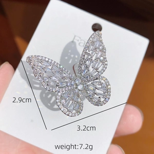 Macro shot of colorful butterfly ring dimensions 2.9cm by 3.2cm with 7.2g weight