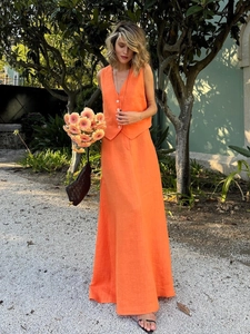 Orange linen two-piece set featuring V-neck waistcoat and maxi skirt for women