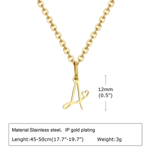 Detail of gold stainless steel necklace with letter A pendant and hollow heart design