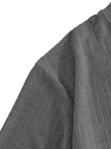 Detail of dark gray waffle knit texture and neckline on men's casual short sleeve set