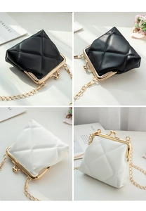 Detailed views of mini quilted coin purses with gold kiss-lock closure and chain straps