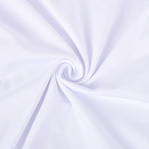 Macro shot of white mesh fabric showing detailed texture and elegant spiral draped pleats