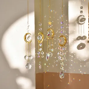 Garden suncatchers with gold moon and star metal frames and faceted rainbow crystals