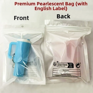 Detail of eco-friendly pearlized packaging bag for keychain with blue bottle pendant