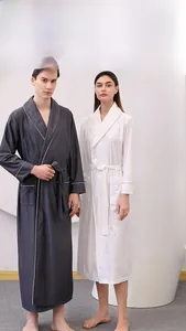 Detail of waffle-weave texture and contrast piping on these long summer bathrobes