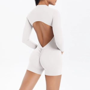 Close-up of the scrunch butt detail and back cutout on this light grey yoga jumpsuit