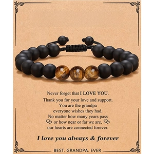 Close-up of tiger eye beaded bracelet on To My Grandpa gift card with brown kraft paper