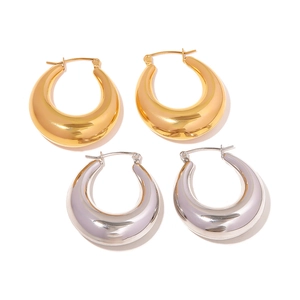 Minimalist thick hoop earrings in gold and silver finish with polished mirror texture