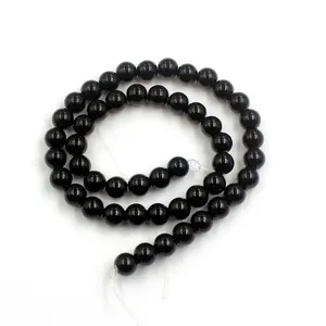 Polished black glass round beads for DIY jewelry making in triple-layered spiral style
