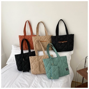 Quilted nylon tote bags in black, khaki, brown, and mint green with small coin purses