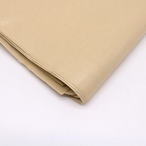 Close-up of brown tissue paper stack showing fine natural texture and clean edges