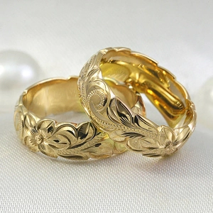 Hawaiian style wide band rings with plumeria engraving in golden finish for couples