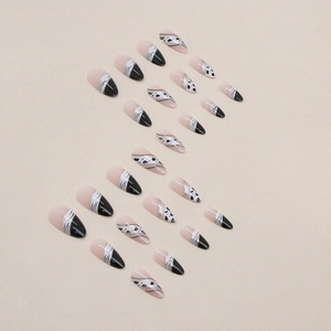 Almond fake nails with black zebra print, cow texture and silver metallic wavy lines