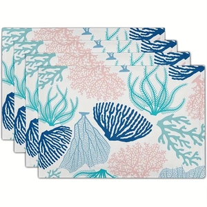Set of 4 rectangular placemats with blue coral and seaweed ocean patterns on white
