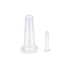 Detail view of two different sizes of clear silicone facial cupping therapy massage cups