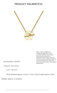Detail of 925 sterling silver flower pendant showing S925 hallmark and 18K gold finish