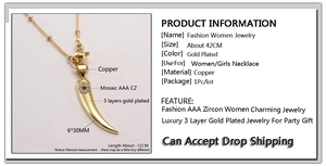 Detailed view of gold horn pendant with AAA zircon evil eye and 42cm chain dimensions