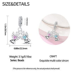 Detail showing Peace and Hope angel charms with blue and pink cubic zirconia and size data
