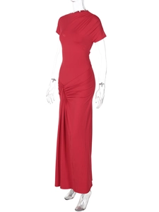 Detail view of red slim fit dress with elegant ruching and lace-up design at the side