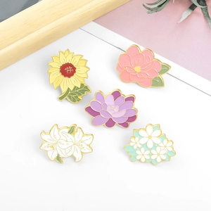 Five-piece floral enamel brooch set featuring sunflower lily and daisy designs