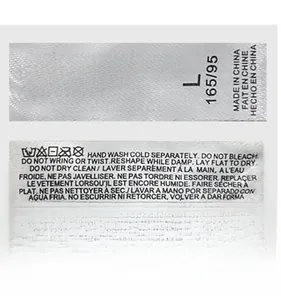 Detail showing the care label with 95% polyester and size L for the lace thong
