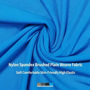 Tight-fit yoga T-shirt in high-elastic brushed fabric with a bright blue smooth texture