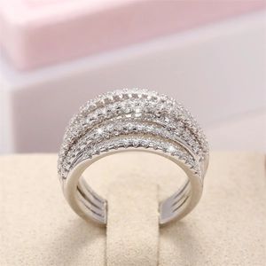 Macro shot of silver multi-layer crisscross ring with pavé-set round cubic zirconia