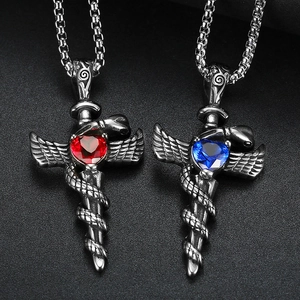 Gothic stainless steel heart pendants with red and blue gems and winged cross design
