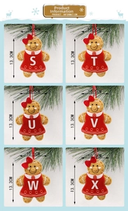 Detailed view of gingerbread man alphabet ornaments with red bows for Christmas decor