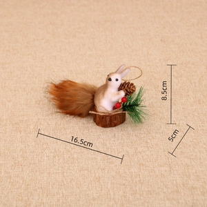 Close-up of decorative squirrel ornament with wood base and size dimensions shown