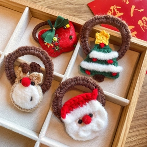 Lot de 4 élastiques de Noël avec Père Noël, renne et sapin sur un plateau en bois